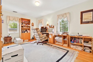 This elegant full-brick colonial sits on a prominent corner lot on Leewood Golf Club in New York - for sale on GolfHomes.com, golf home, golf lot