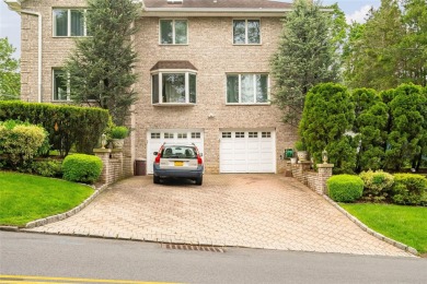 This elegant full-brick colonial sits on a prominent corner lot on Leewood Golf Club in New York - for sale on GolfHomes.com, golf home, golf lot