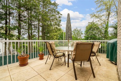 This elegant full-brick colonial sits on a prominent corner lot on Leewood Golf Club in New York - for sale on GolfHomes.com, golf home, golf lot