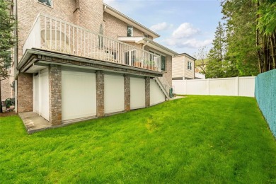 This elegant full-brick colonial sits on a prominent corner lot on Leewood Golf Club in New York - for sale on GolfHomes.com, golf home, golf lot