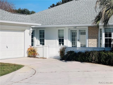 Charming Florida Designed Sun Terrace-Courtyard Entry Home on Royal Oaks Golf Club in Florida - for sale on GolfHomes.com, golf home, golf lot