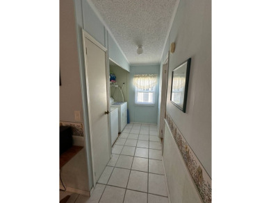 If you are looking for a home with space, then this doublewide on Anglers Green Golf Course in Florida - for sale on GolfHomes.com, golf home, golf lot