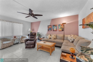 Enjoy South Florida living with this 2Bed/2Bath second floor on Hillsboro Pines Golf in Florida - for sale on GolfHomes.com, golf home, golf lot