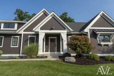 Welcome to this stunning custom-built stand-alone condo, located on Thousand Oaks Golf Club in Michigan - for sale on GolfHomes.com, golf home, golf lot