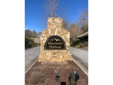 Come take a scenic drive through The Ridges at Mountain Harbour on Mountain Harbour Golf Club in North Carolina - for sale on GolfHomes.com, golf home, golf lot