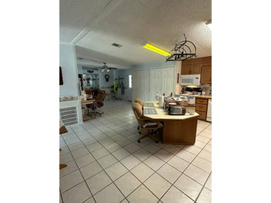 If you are looking for a home with space, then this doublewide on Anglers Green Golf Course in Florida - for sale on GolfHomes.com, golf home, golf lot