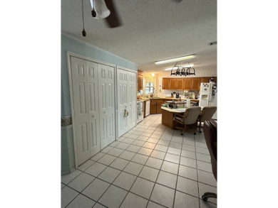 If you are looking for a home with space, then this doublewide on Anglers Green Golf Course in Florida - for sale on GolfHomes.com, golf home, golf lot