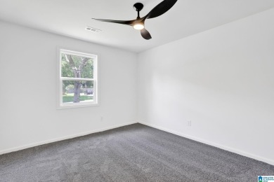Welcome to 2129 Vicki Dr - a spacious one-level home zoned for on Grayson Valley Country Club in Alabama - for sale on GolfHomes.com, golf home, golf lot