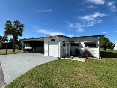 If you are looking for a home with space, then this doublewide on Anglers Green Golf Course in Florida - for sale on GolfHomes.com, golf home, golf lot