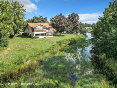 Tired of looking at the same old cookie cutter style homes? Then on Sugarmill Woods Golf and Country Club in Florida - for sale on GolfHomes.com, golf home, golf lot