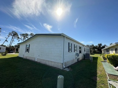 If you are looking for a home with space, then this doublewide on Anglers Green Golf Course in Florida - for sale on GolfHomes.com, golf home, golf lot