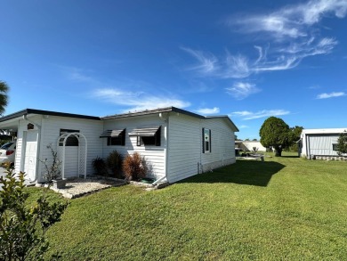 If you are looking for a home with space, then this doublewide on Anglers Green Golf Course in Florida - for sale on GolfHomes.com, golf home, golf lot