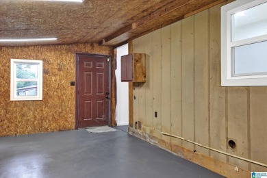 Welcome to 2129 Vicki Dr - a spacious one-level home zoned for on Grayson Valley Country Club in Alabama - for sale on GolfHomes.com, golf home, golf lot