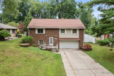 Welcome to 1819 Fulton Street NW! Situated on a serene street on Mines Golf Course in Michigan - for sale on GolfHomes.com, golf home, golf lot