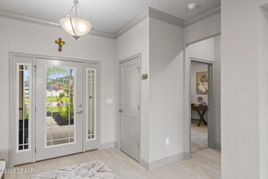 Discover this beautifully maintained 3-bedroom, 2-bathroom home on The Grand Club Cypress Course in Florida - for sale on GolfHomes.com, golf home, golf lot