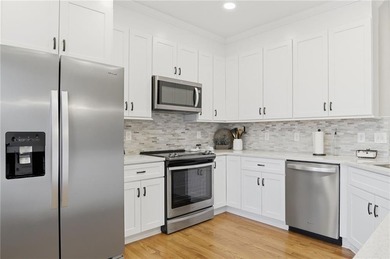 This Qaint Cottage Sits on a Private Wooded Corner Lot Making it on The Highlands Course at Lake Arrowhead in Georgia - for sale on GolfHomes.com, golf home, golf lot