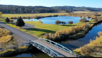 Beautifully wooded, nearly 3/4 acre lot offered for sale in the on Meadowcreek Golf Resort in Idaho - for sale on GolfHomes.com, golf home, golf lot