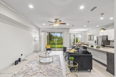 Discover this beautifully maintained 3-bedroom, 2-bathroom home on The Grand Club Cypress Course in Florida - for sale on GolfHomes.com, golf home, golf lot