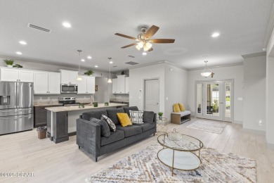 Discover this beautifully maintained 3-bedroom, 2-bathroom home on The Grand Club Cypress Course in Florida - for sale on GolfHomes.com, golf home, golf lot