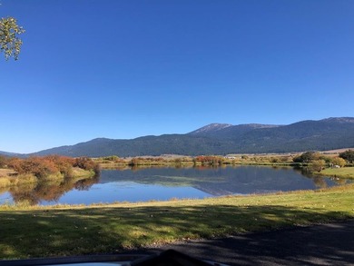 Beautifully wooded, nearly 3/4 acre lot offered for sale in the on Meadowcreek Golf Resort in Idaho - for sale on GolfHomes.com, golf home, golf lot
