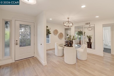 Spectacular LEVEL IN single story, end unit Whitney! Lights on Rossmoor Golf Course in California - for sale on GolfHomes.com, golf home, golf lot