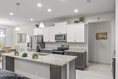 Discover this beautifully maintained 3-bedroom, 2-bathroom home on The Grand Club Cypress Course in Florida - for sale on GolfHomes.com, golf home, golf lot