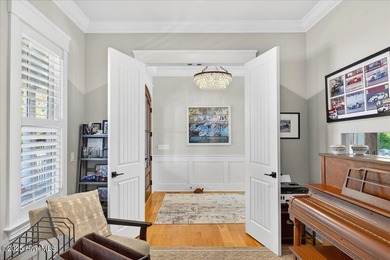 Situated within an exceptionally private cul-de-sac and embraced on Members Club At St. James Plantation in North Carolina - for sale on GolfHomes.com, golf home, golf lot