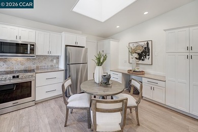 Spectacular LEVEL IN single story, end unit Whitney! Lights on Rossmoor Golf Course in California - for sale on GolfHomes.com, golf home, golf lot