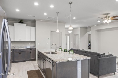 Discover this beautifully maintained 3-bedroom, 2-bathroom home on The Grand Club Cypress Course in Florida - for sale on GolfHomes.com, golf home, golf lot