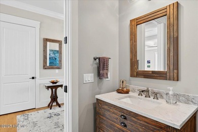 Situated within an exceptionally private cul-de-sac and embraced on Members Club At St. James Plantation in North Carolina - for sale on GolfHomes.com, golf home, golf lot