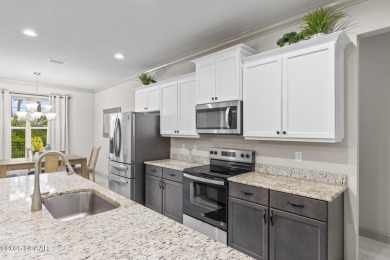 Discover this beautifully maintained 3-bedroom, 2-bathroom home on The Grand Club Cypress Course in Florida - for sale on GolfHomes.com, golf home, golf lot