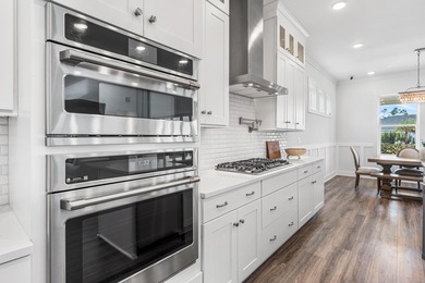 Experience the pinnacle of coastal luxury in this pristine on Origins Golf Club in Florida - for sale on GolfHomes.com, golf home, golf lot