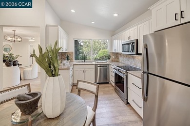 Spectacular LEVEL IN single story, end unit Whitney! Lights on Rossmoor Golf Course in California - for sale on GolfHomes.com, golf home, golf lot