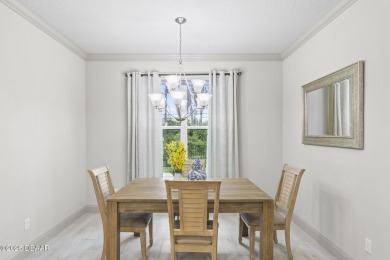 Discover this beautifully maintained 3-bedroom, 2-bathroom home on The Grand Club Cypress Course in Florida - for sale on GolfHomes.com, golf home, golf lot