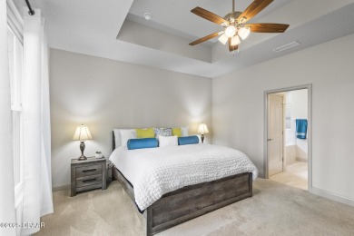 Discover this beautifully maintained 3-bedroom, 2-bathroom home on The Grand Club Cypress Course in Florida - for sale on GolfHomes.com, golf home, golf lot