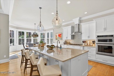 Situated within an exceptionally private cul-de-sac and embraced on Members Club At St. James Plantation in North Carolina - for sale on GolfHomes.com, golf home, golf lot