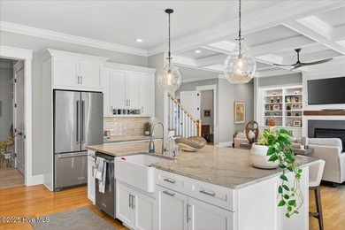 Situated within an exceptionally private cul-de-sac and embraced on Members Club At St. James Plantation in North Carolina - for sale on GolfHomes.com, golf home, golf lot