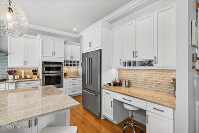 Situated within an exceptionally private cul-de-sac and embraced on Members Club At St. James Plantation in North Carolina - for sale on GolfHomes.com, golf home, golf lot