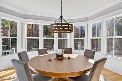 Situated within an exceptionally private cul-de-sac and embraced on Members Club At St. James Plantation in North Carolina - for sale on GolfHomes.com, golf home, golf lot