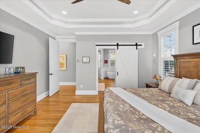 Situated within an exceptionally private cul-de-sac and embraced on Members Club At St. James Plantation in North Carolina - for sale on GolfHomes.com, golf home, golf lot