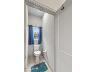 Discover this beautifully maintained 3-bedroom, 2-bathroom home on The Grand Club Cypress Course in Florida - for sale on GolfHomes.com, golf home, golf lot