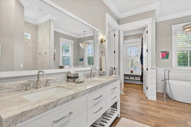 Situated within an exceptionally private cul-de-sac and embraced on Members Club At St. James Plantation in North Carolina - for sale on GolfHomes.com, golf home, golf lot