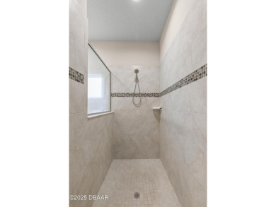 Discover this beautifully maintained 3-bedroom, 2-bathroom home on The Grand Club Cypress Course in Florida - for sale on GolfHomes.com, golf home, golf lot
