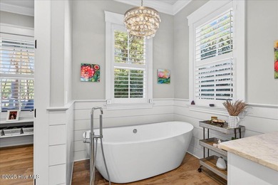 Situated within an exceptionally private cul-de-sac and embraced on Members Club At St. James Plantation in North Carolina - for sale on GolfHomes.com, golf home, golf lot