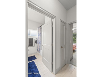 Discover this beautifully maintained 3-bedroom, 2-bathroom home on The Grand Club Cypress Course in Florida - for sale on GolfHomes.com, golf home, golf lot