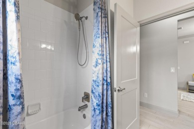 Discover this beautifully maintained 3-bedroom, 2-bathroom home on The Grand Club Cypress Course in Florida - for sale on GolfHomes.com, golf home, golf lot