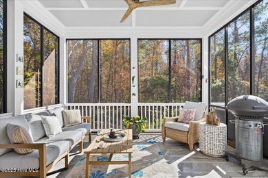 Situated within an exceptionally private cul-de-sac and embraced on Members Club At St. James Plantation in North Carolina - for sale on GolfHomes.com, golf home, golf lot