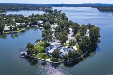 Savor sparkling Lake Balboa views from almost every room at this on Ponce De Leon Golf Course in Arkansas - for sale on GolfHomes.com, golf home, golf lot