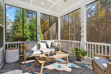 Situated within an exceptionally private cul-de-sac and embraced on Members Club At St. James Plantation in North Carolina - for sale on GolfHomes.com, golf home, golf lot