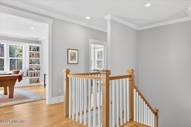 Situated within an exceptionally private cul-de-sac and embraced on Members Club At St. James Plantation in North Carolina - for sale on GolfHomes.com, golf home, golf lot